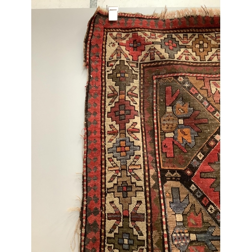 87 - An antique Caucasian geometric rug, 250 x 140cm, together with a Belouch prayer rug, 130 x 78cm. Con... 