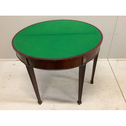 90 - An Edwardian inlaid mahogany demi lune card table, width 91cm, height 73cm. Condition - top scratche... 