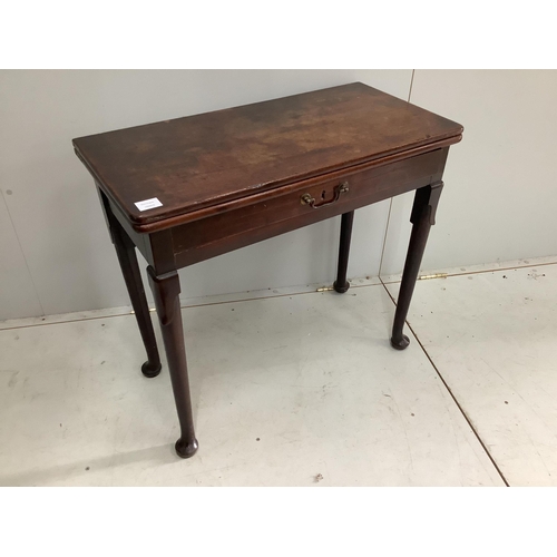 97 - A George II mahogany folding tea table, width 81cm, height 73cm. Condition - fair to good