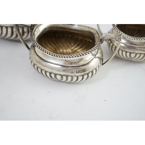 100 - A late Victorian demi-fluted silver three piece tea set, by Horace Woodward & Co Ltd, of oval form, ... 