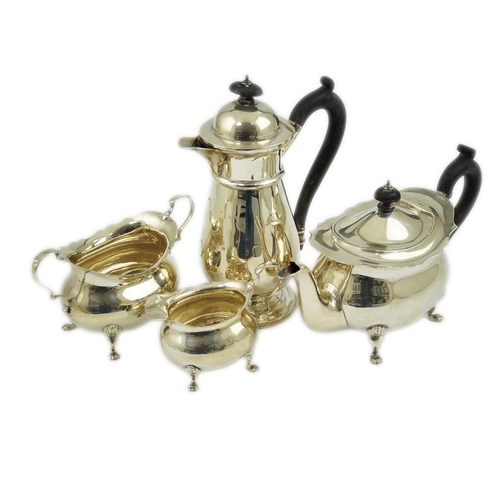 103 - A late Victorian silver four piece tea set by Walker & Hall, of oval form, comprising a teapot, hot ... 