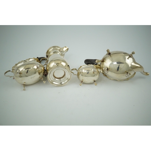 103 - A late Victorian silver four piece tea set by Walker & Hall, of oval form, comprising a teapot, hot ... 