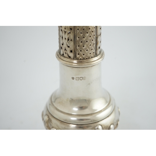 105 - An Edwardian silver baluster sugar caster, by The Barnards, on pedestal foot, with demi-fluted decor... 