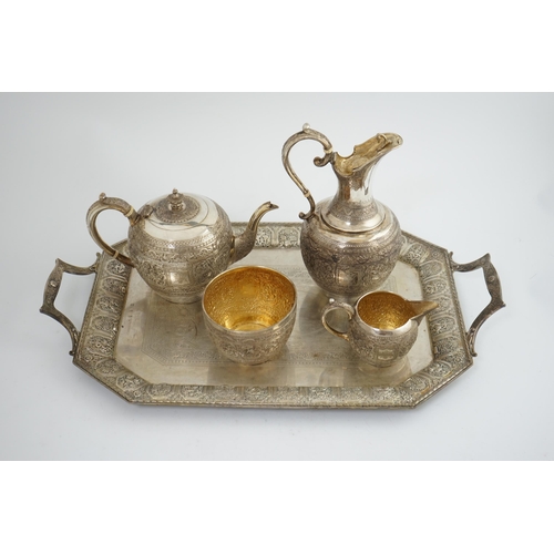 108 - An Edwardian Scottish Anglo-Indian five piece tea set by James Reid & Co, comprising a two handed te... 