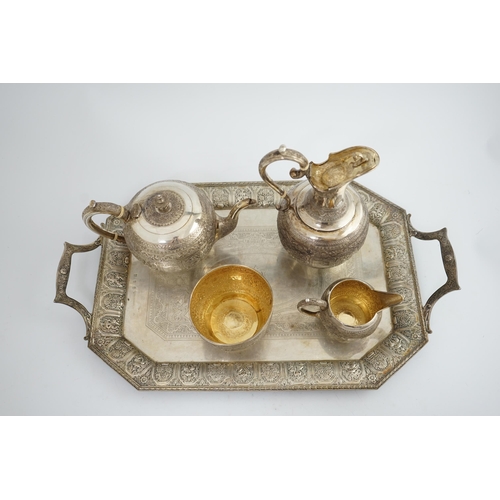 108 - An Edwardian Scottish Anglo-Indian five piece tea set by James Reid & Co, comprising a two handed te... 