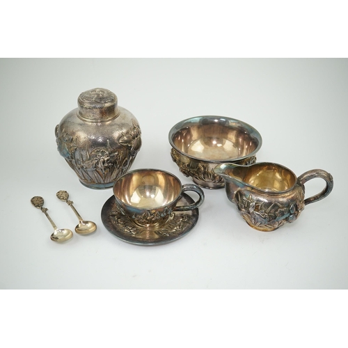 110 - An early 20th century Japanese Meiji period planished silver matched? part tea set comprising a tea ... 