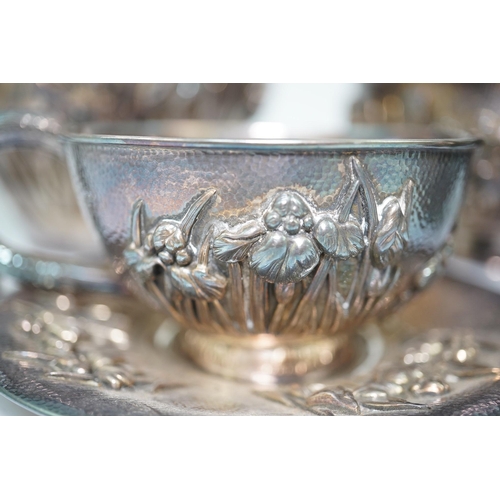 110 - An early 20th century Japanese Meiji period planished silver matched? part tea set comprising a tea ... 