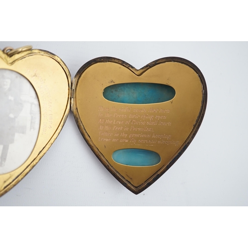 113 - An Edwardian silver gilt? and guilloche enamel large heart shaped memorial locket, the cover set wit... 