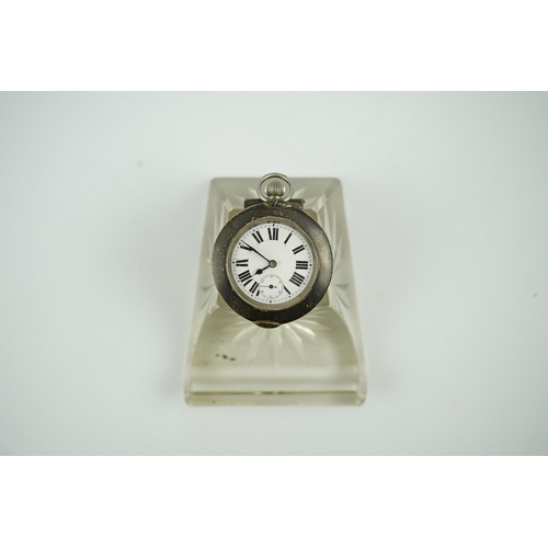 120 - An Edwardian silver watch mounted glass inkwell, maker's mark rubbed, of shaped rectangular form, wi... 