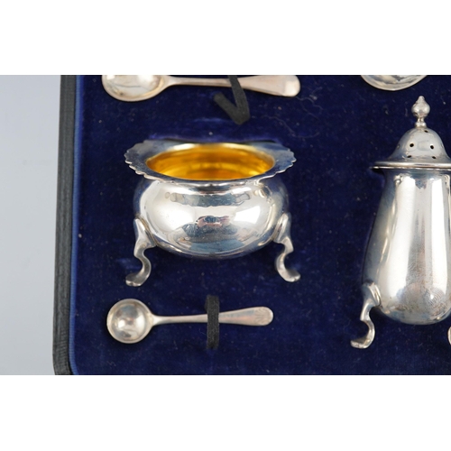 123 - A George V cased silver seven piece condiment set by Horace Woodward & Co Ltd, Birmingham, 1918, wit... 