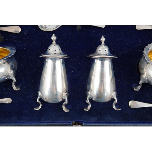 123 - A George V cased silver seven piece condiment set by Horace Woodward & Co Ltd, Birmingham, 1918, wit... 