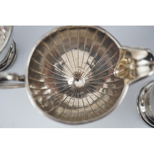 125 - A George V panelled silver five piece tea set by Adie Brothers, of circular pedestal form, Birmingha... 