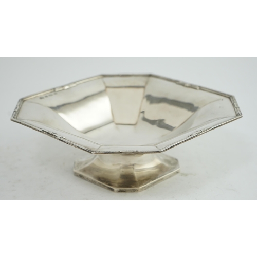 128 - A George V Art Deco silver pedestal fruit bowl, by Elkington & Co, of square form, with canted corne... 