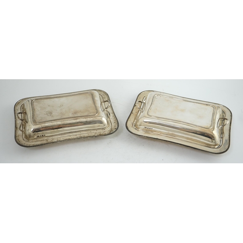 129 - A pair of 1930's silver entrée dishes and covers, by Roberts & Belk, of rectangular form, Sheffield,... 