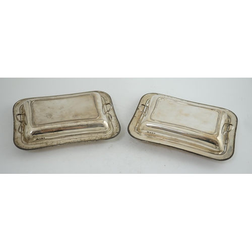 129 - A pair of 1930's silver entrée dishes and covers, by Roberts & Belk, of rectangular form, Sheffield,... 