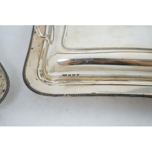 129 - A pair of 1930's silver entrée dishes and covers, by Roberts & Belk, of rectangular form, Sheffield,... 