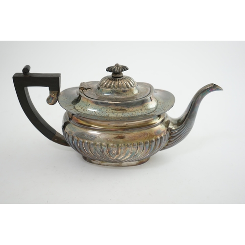 136 - An Elizabeth II demi-fluted silver teapot, by Asprey & Co Ltd, of oval form, Birmingham, 1971, gross... 