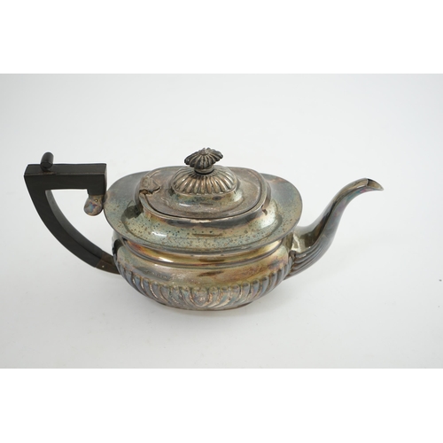 136 - An Elizabeth II demi-fluted silver teapot, by Asprey & Co Ltd, of oval form, Birmingham, 1971, gross... 