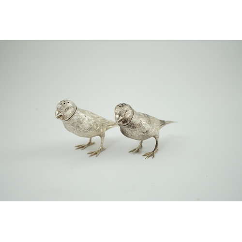 149 - A pair of Elizabeth II silver novelty free-standing pepperettes, modelled as sparrows, by Israel Fre... 