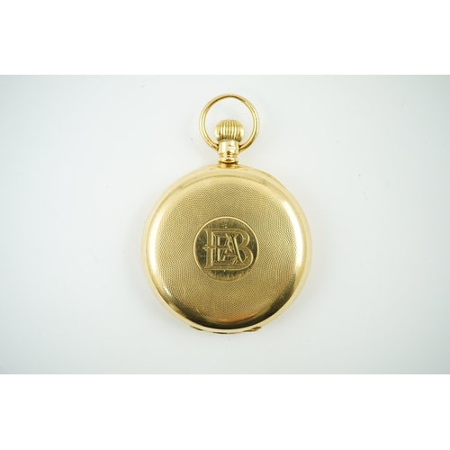 163 - An Edwardian engine turned 18ct gold Waltham hunter keyless pocket watch, with engraved monogram and... 