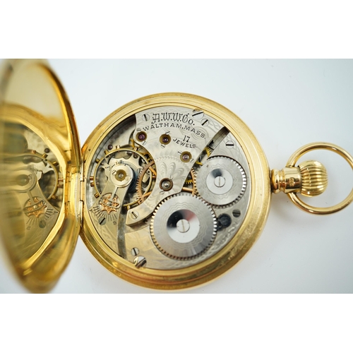 163 - An Edwardian engine turned 18ct gold Waltham hunter keyless pocket watch, with engraved monogram and... 