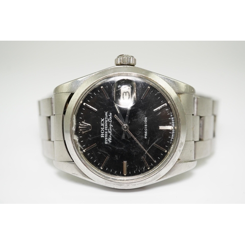 174 - A gentleman's mid 1980's stainless steel Rolex Oyster Perpetual Air-King Date wrist watch, on a stai... 