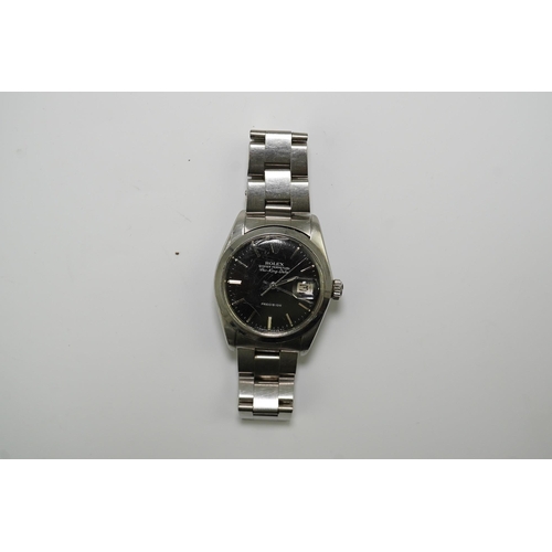 174 - A gentleman's mid 1980's stainless steel Rolex Oyster Perpetual Air-King Date wrist watch, on a stai... 