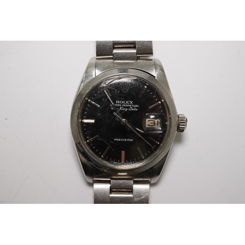 174 - A gentleman's mid 1980's stainless steel Rolex Oyster Perpetual Air-King Date wrist watch, on a stai... 