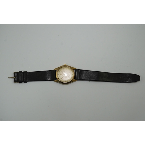 175 - A gentleman's 1950's 9ct gold Omega manual wind wrist watch, with baton and Arabic numerals, movemen... 