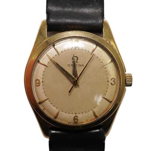 175 - A gentleman's 1950's 9ct gold Omega manual wind wrist watch, with baton and Arabic numerals, movemen... 