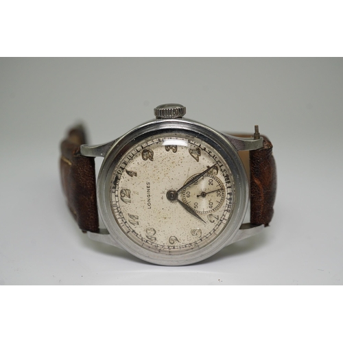 178 - A gentleman's mid 1940's steel Longines military manual wind wrist watch, with Arabic dial and subsi... 