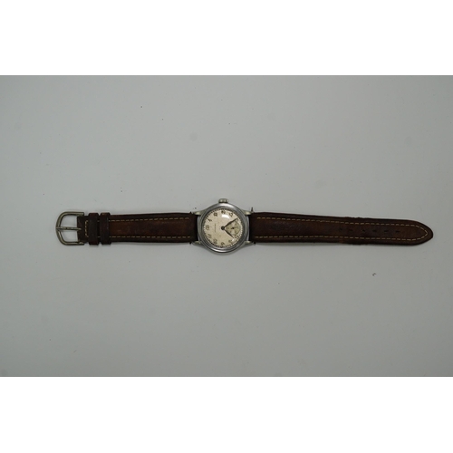 178 - A gentleman's mid 1940's steel Longines military manual wind wrist watch, with Arabic dial and subsi... 