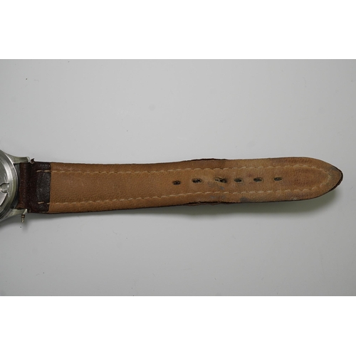 178 - A gentleman's mid 1940's steel Longines military manual wind wrist watch, with Arabic dial and subsi... 