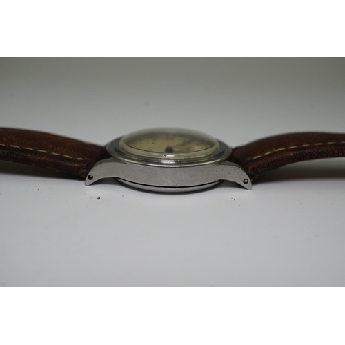 178 - A gentleman's mid 1940's steel Longines military manual wind wrist watch, with Arabic dial and subsi... 