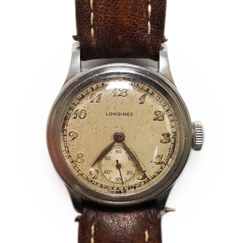 178 - A gentleman's mid 1940's steel Longines military manual wind wrist watch, with Arabic dial and subsi... 