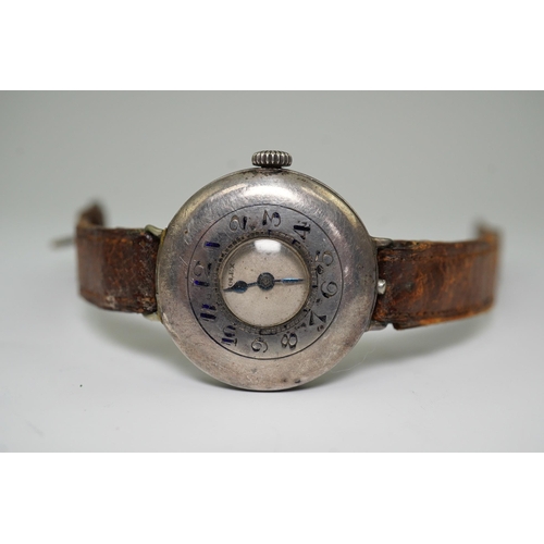 181 - A gentleman's mid 1920's silver Rolex half hunter manual wind wrist watch, with enamelled Arabic cha... 