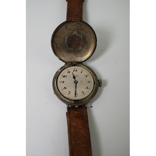 181 - A gentleman's mid 1920's silver Rolex half hunter manual wind wrist watch, with enamelled Arabic cha... 