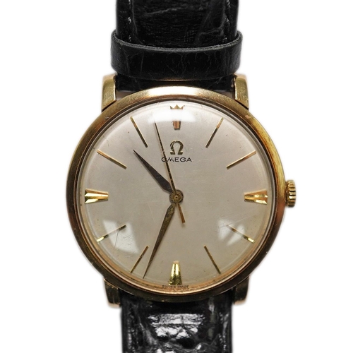 182 - A gentleman's late 1950's 9ct gold Omega manual wind wrist watch, with baton numerals, movement c.52... 