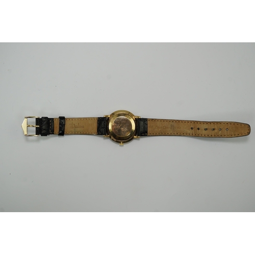 182 - A gentleman's late 1950's 9ct gold Omega manual wind wrist watch, with baton numerals, movement c.52... 