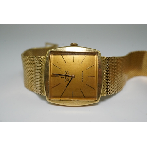 183 - A gentleman's early 1960's 18ct gold Omega De Ville automatic dress wrist watch, on integral Omega 1... 