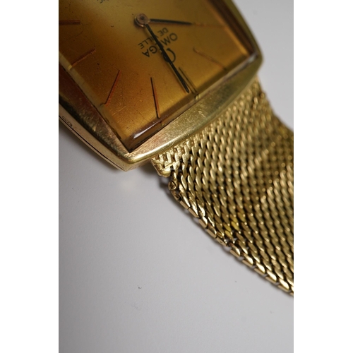 183 - A gentleman's early 1960's 18ct gold Omega De Ville automatic dress wrist watch, on integral Omega 1... 