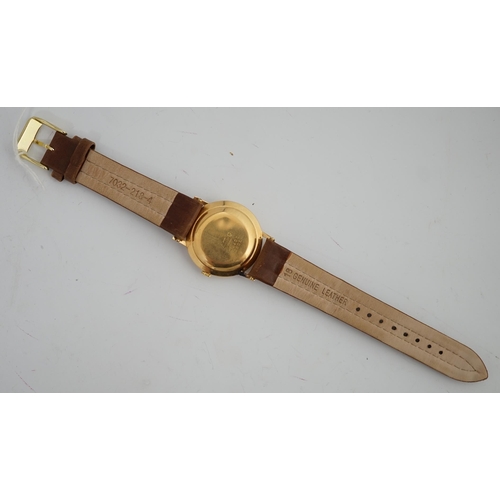 184 - A gentleman's 18k gold Valmon automatic wrist watch, with baton numerals and date aperture, case dia... 