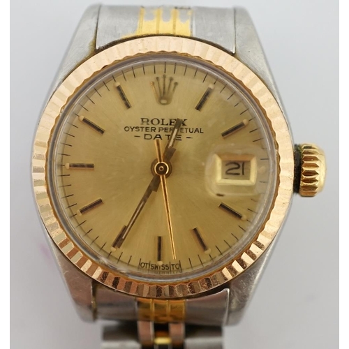 186 - A lady's late 20th century steel and gold Rolex Oyster Perpetual Date wrist watch, with yellow dial ... 