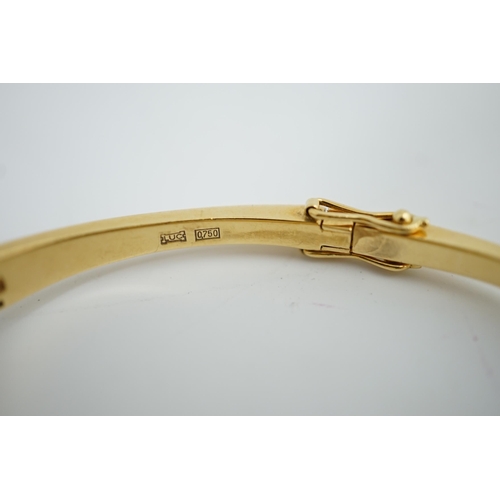 187 - A lady's 18k gold Swiss Chopard manual wind hinged bangle wrist watch, interior diameter 60mm, gross... 