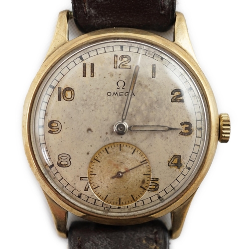 188 - A gentleman's early 1940's 9ct gold Omega manual wind wrist watch, with Arabic dial and subsidiary s... 