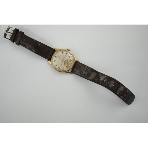 188 - A gentleman's early 1940's 9ct gold Omega manual wind wrist watch, with Arabic dial and subsidiary s... 