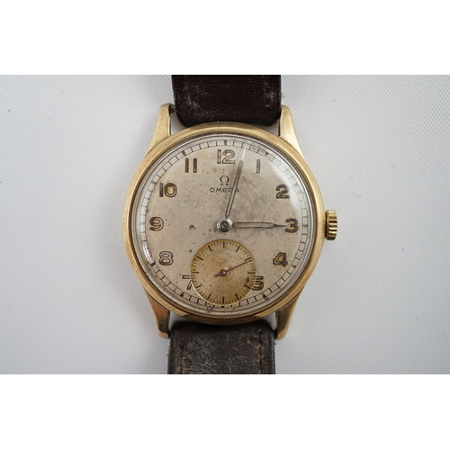 188 - A gentleman's early 1940's 9ct gold Omega manual wind wrist watch, with Arabic dial and subsidiary s... 