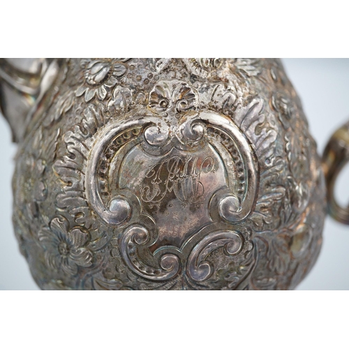 20 - A George III silver pedestal coffee pot, with later embossed decoration, of pyriform, with engraved ... 