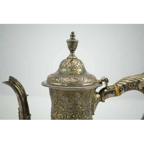 20 - A George III silver pedestal coffee pot, with later embossed decoration, of pyriform, with engraved ... 