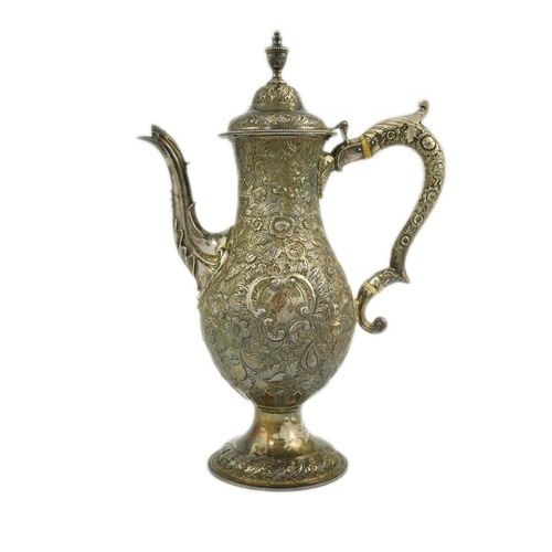 20 - A George III silver pedestal coffee pot, with later embossed decoration, of pyriform, with engraved ... 